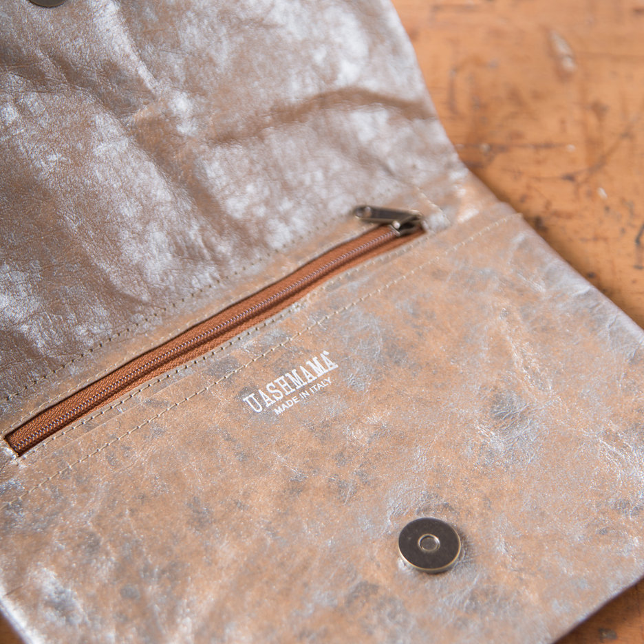 Distressed metallic Uashmama clutch bag