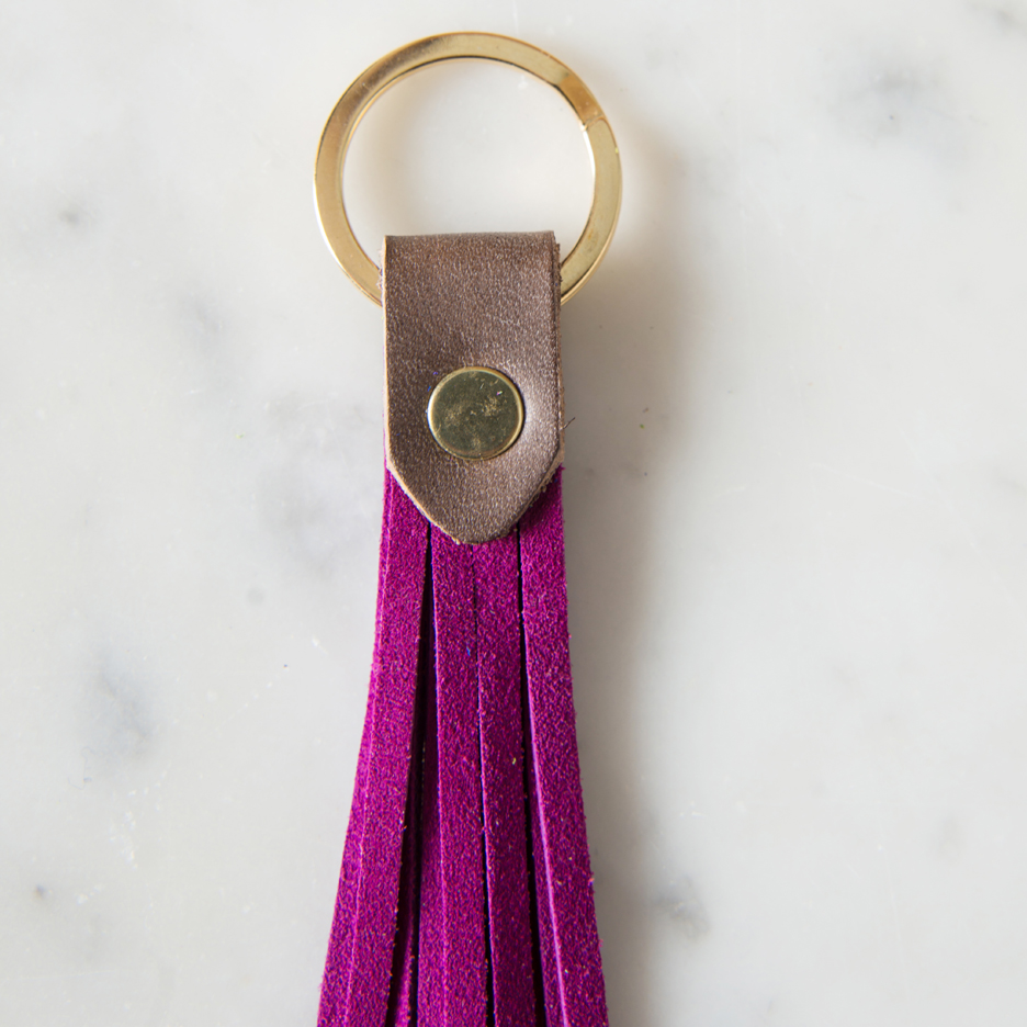 Suede and leather tassel key ring fuchsia pink